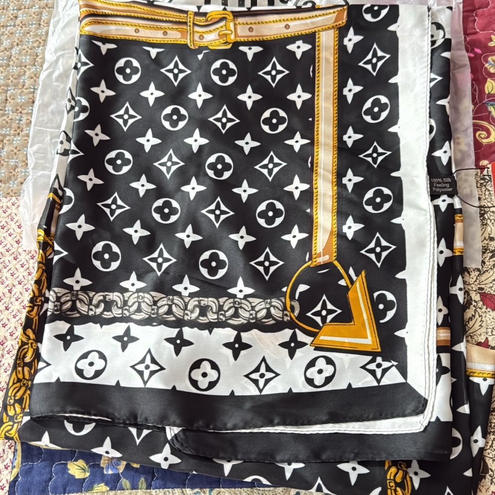 Stylish new scarf, use to style your bag or use yourself